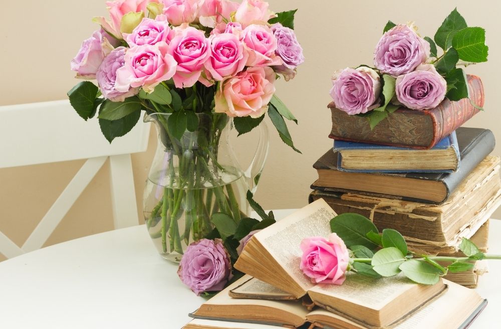 A dining table decorated with books