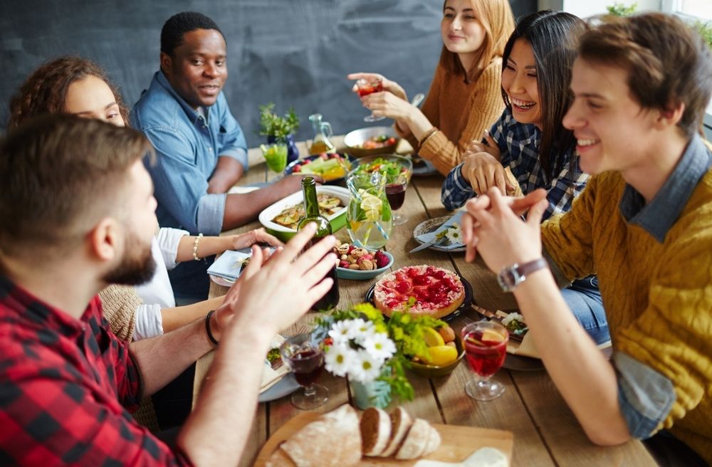 Group conversation dinner party