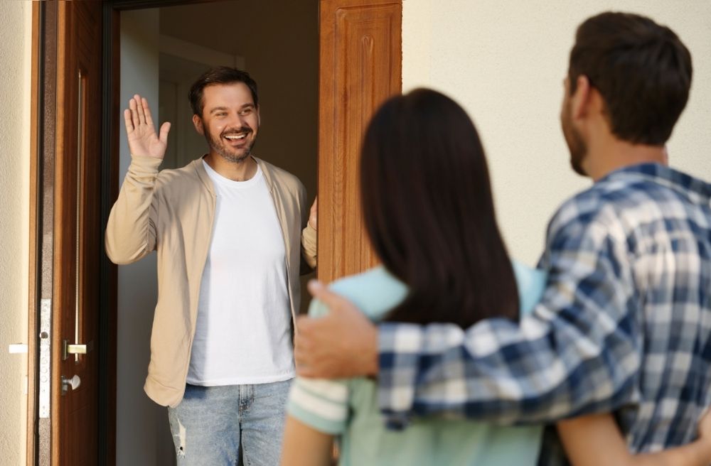 Guest saying goodbye at front door