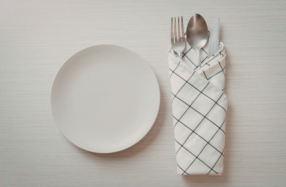 Neatly folded linen napkins
