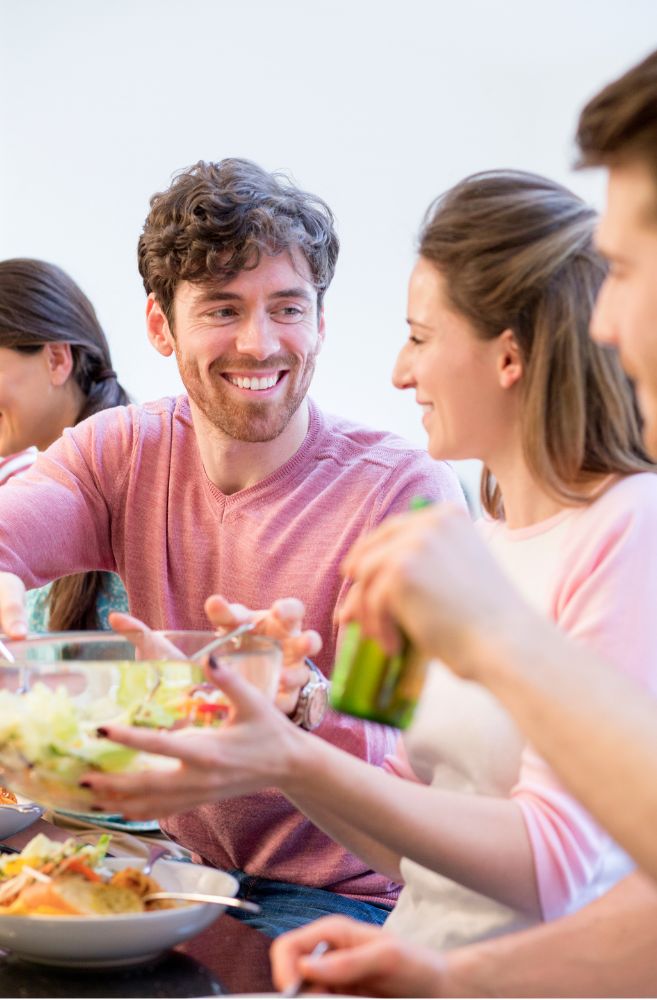 dinner party guests having engaging conversation