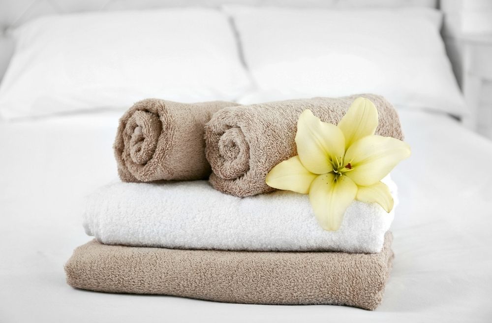 fresh towels in guest bedroom