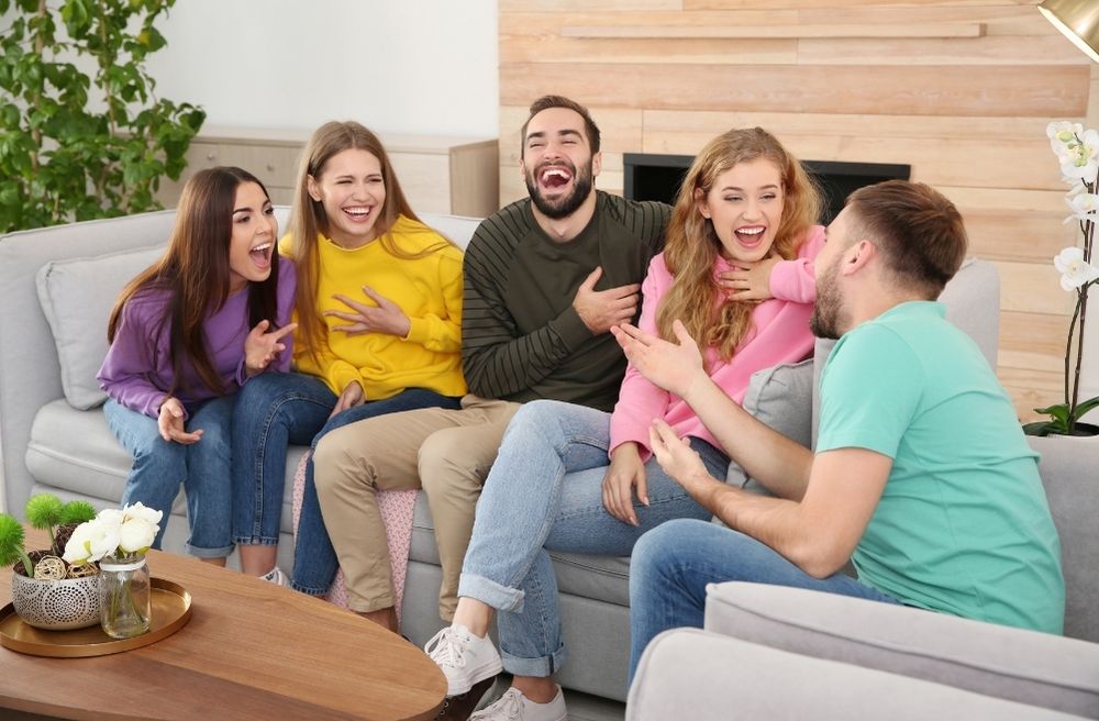 friends enjoying conversation with soft background music