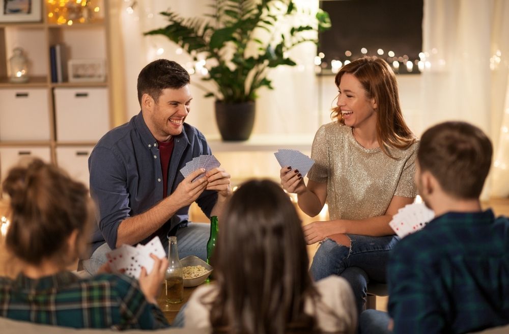 friends playing party games at home