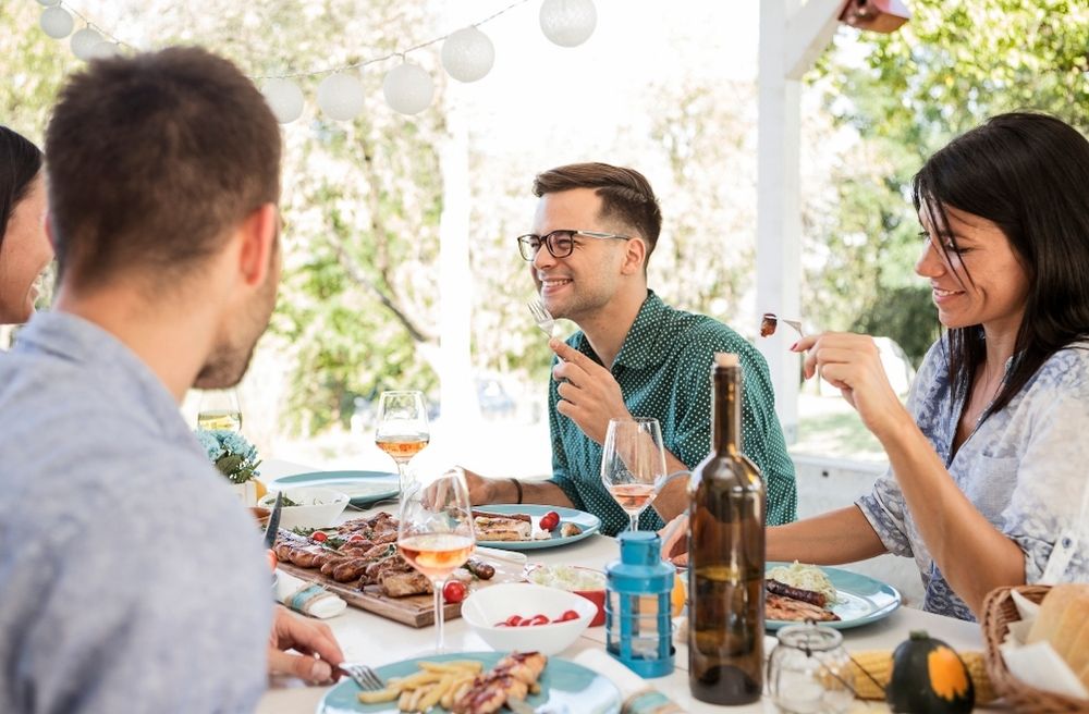 guests connecting over shared interests at dinner party