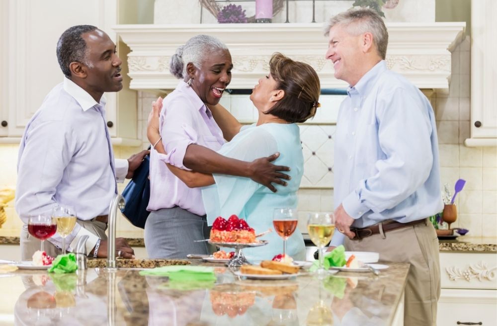 guests saying goodbye with smiles and hug