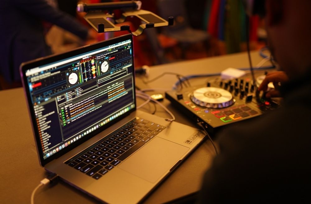 host preparing playlist before party