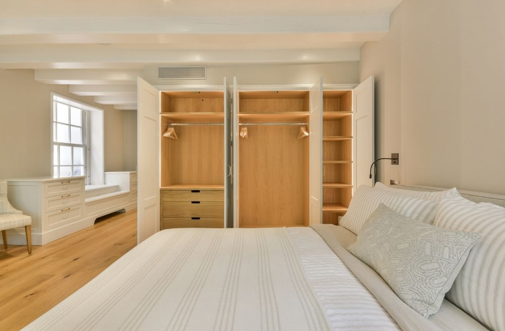 organized guest bedroom dresser and closet