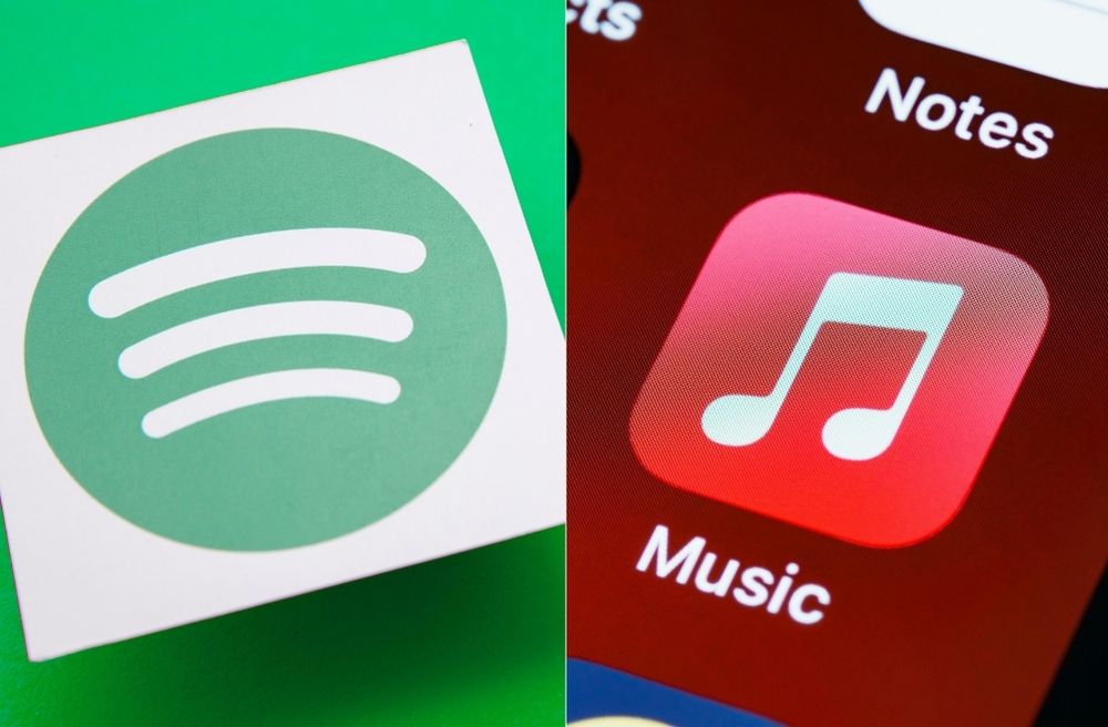 person using music streaming app on smart speaker
