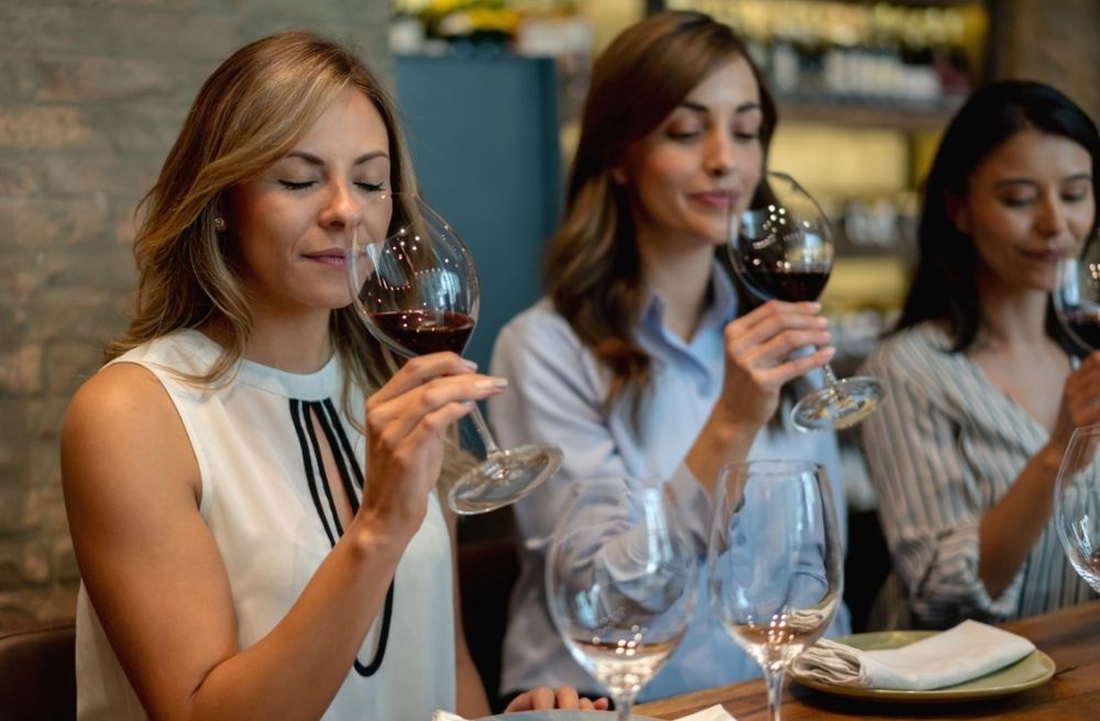 Women tasting wine