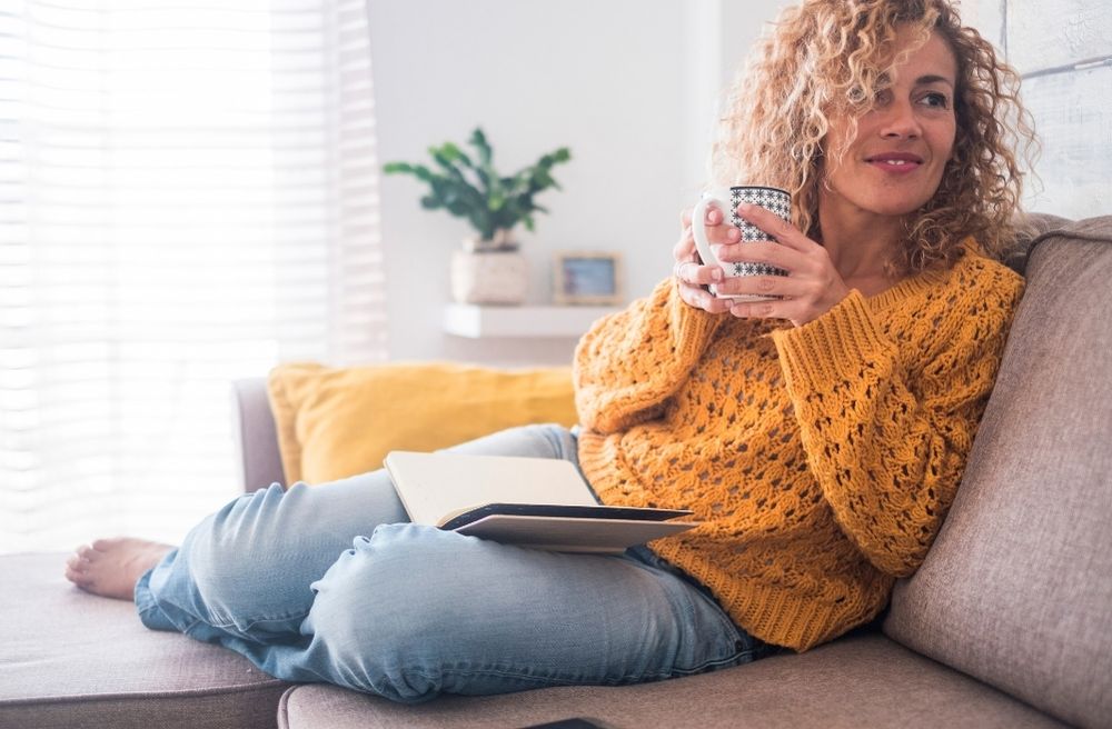 woman relaxing with coffee at home