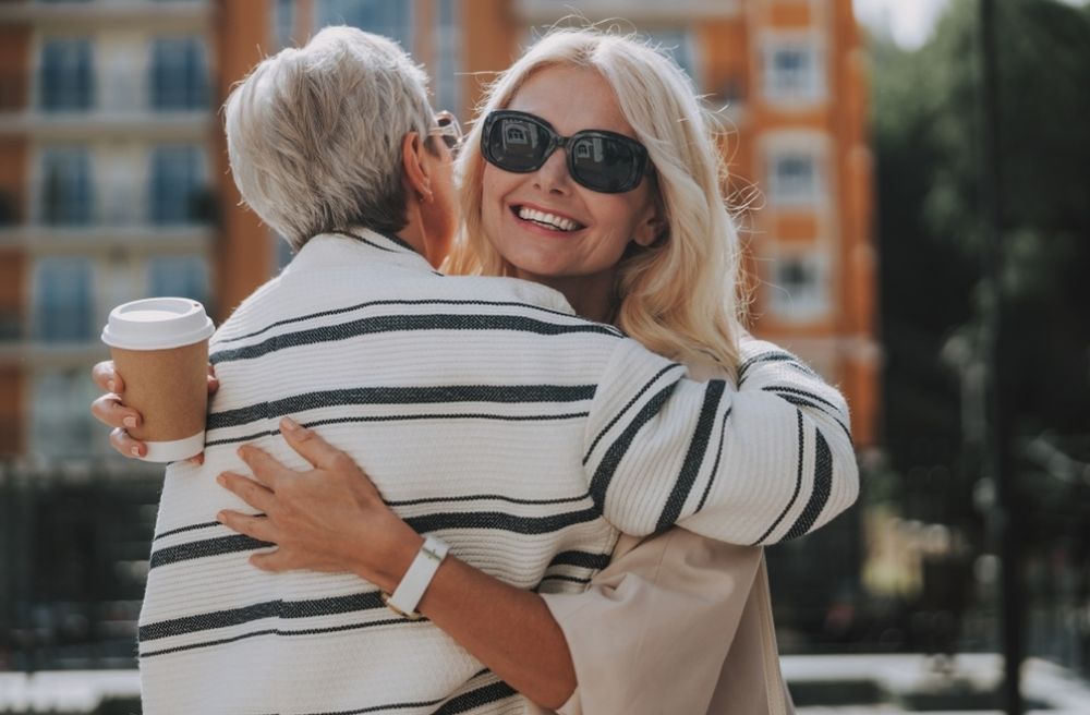 woman thanking friends goodbye