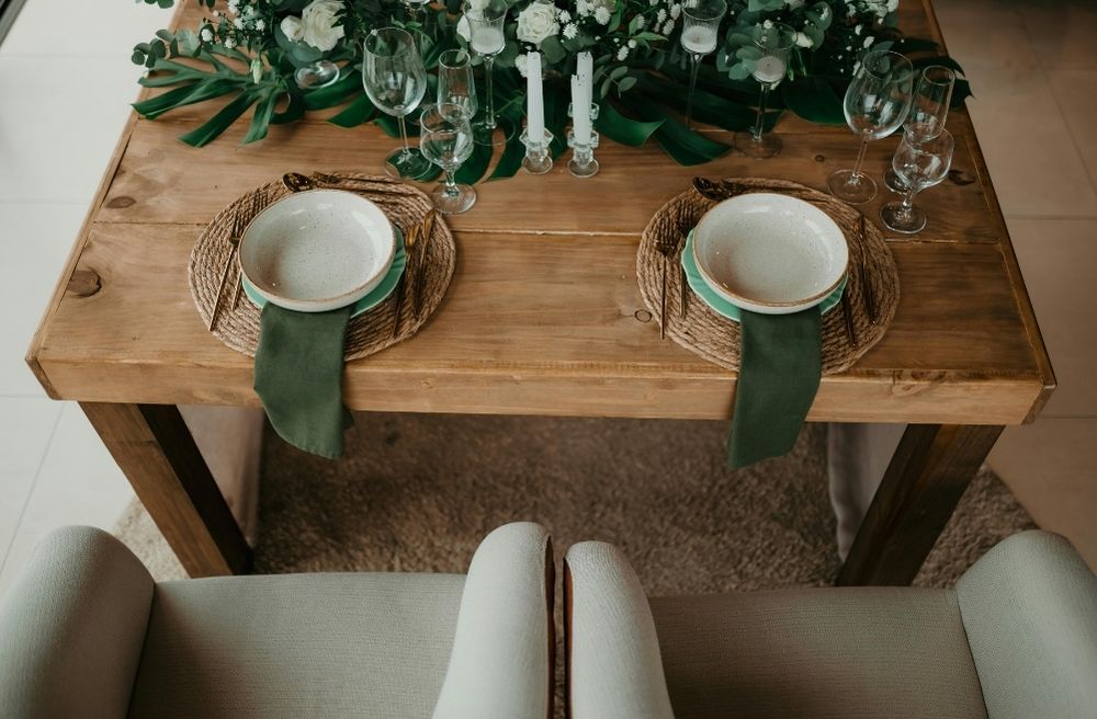 wood and greenery table setting