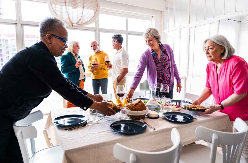 A host creating a comfortable and welcoming atmosphere for guests