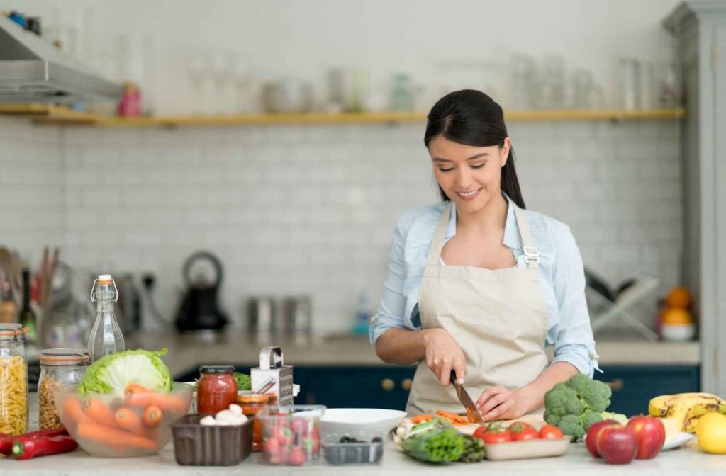 elegant dinner party host preparing food