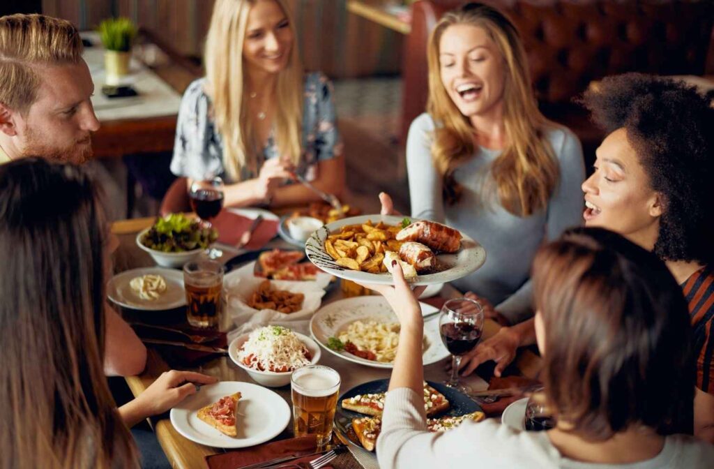 friends enjoying conversation meal