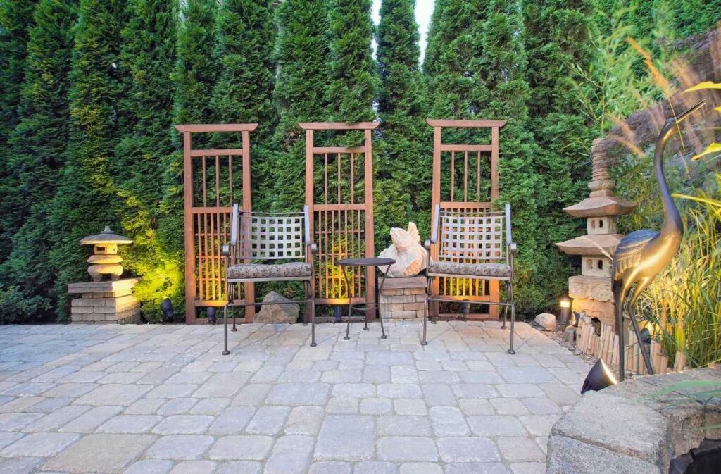 patio featuring a lush vertical garden