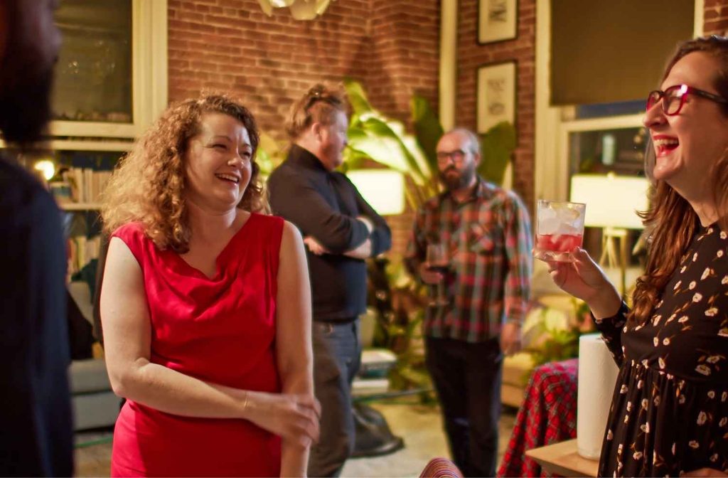guests naturally chatting at party