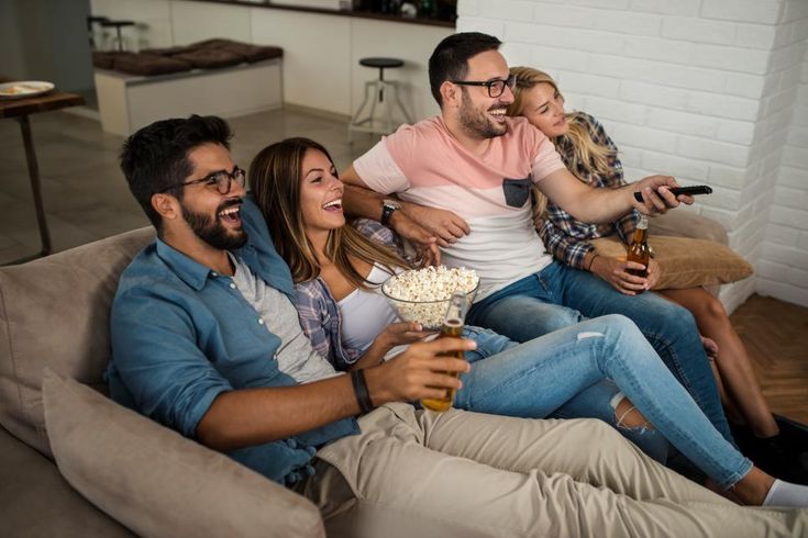 host and guests relaxing at home