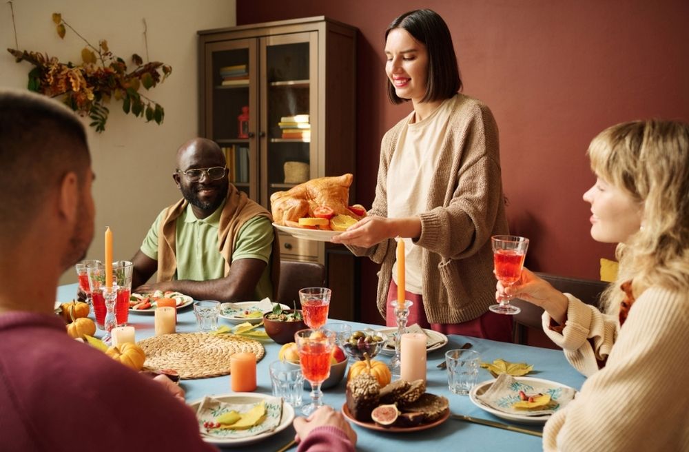 host cooking dinner guests home