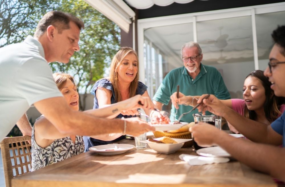 host enjoying brunch with guests