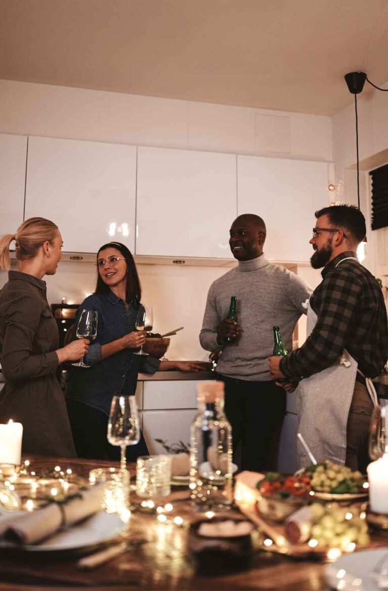 host introducing guests at dinner party