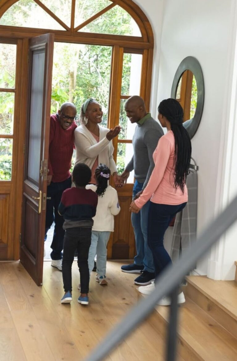 host welcoming guests home