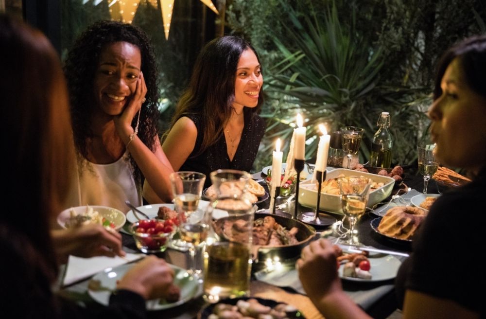 tired woman at dinner party