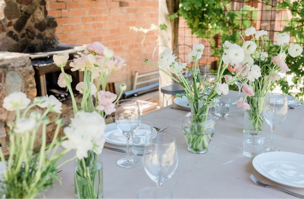 outdoor dining table fresh flowers