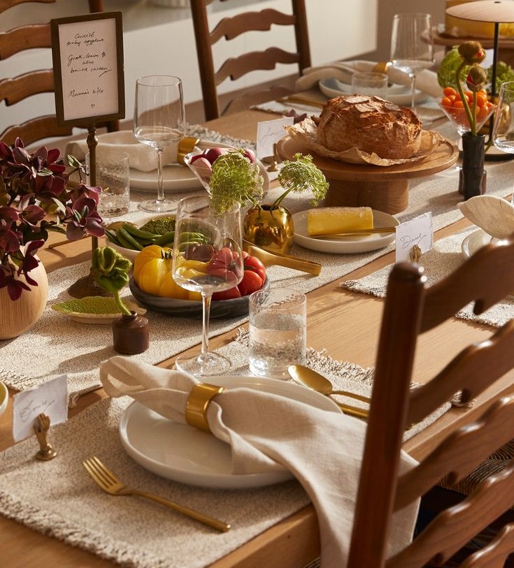 seasonal dinner table candles herbs