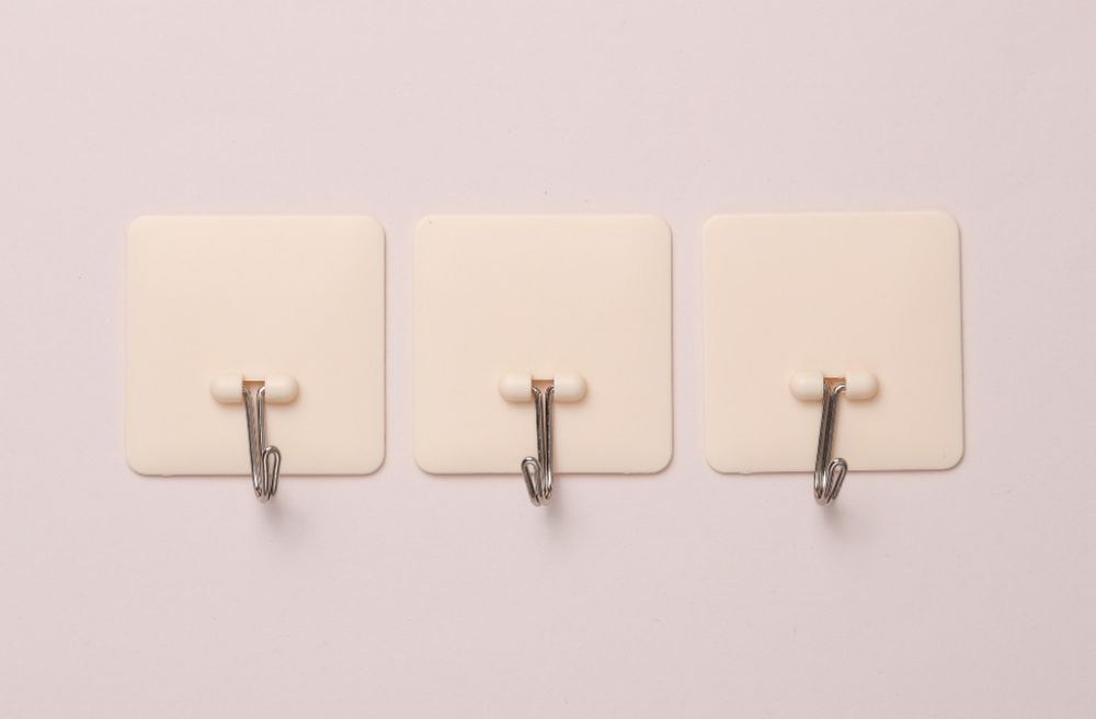 small adhesive hooks