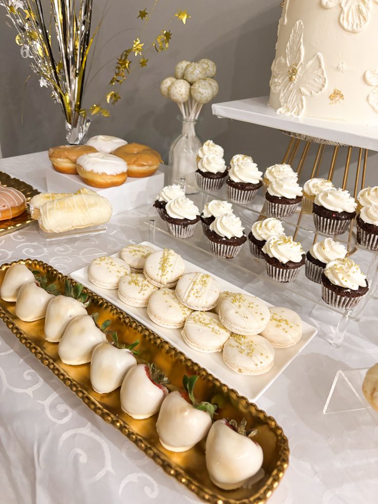 gold white dessert table