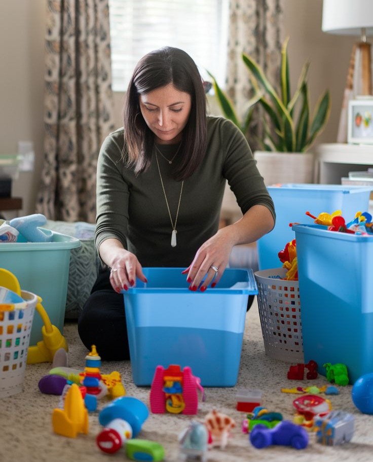 parent tidying toys