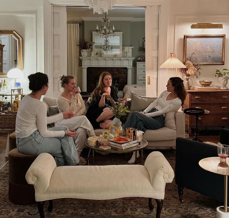 relaxed friends chatting in living room